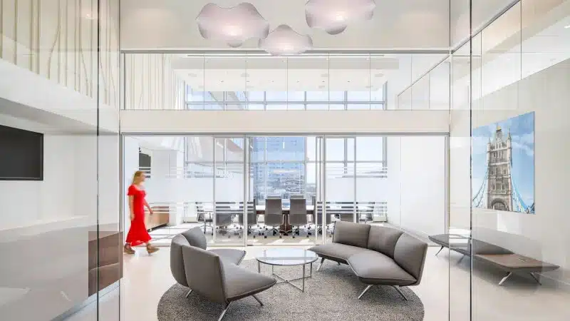 Interior shot of Banner Life office sitting area with blurred employee walking by